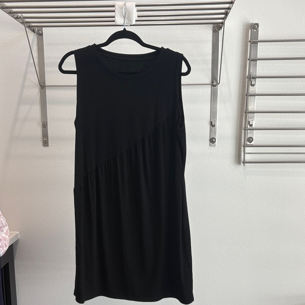 Sleeveless Black Midi Dress with Diagonal Seam